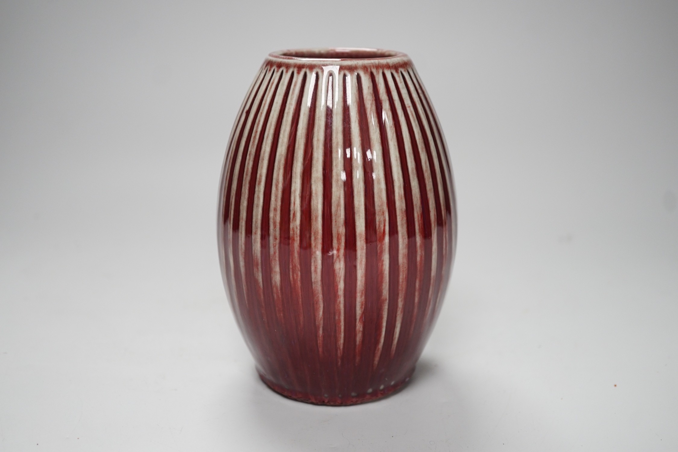 A Chinese Sang De Boeuf vase, 15cm